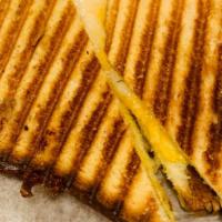 Truffle Grilled Cheese  · Our famous grilled cheese with a bit of truffle spread oil.
