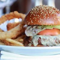 Aged Prime Beef Burger · French fries, lettuce, and tomato.