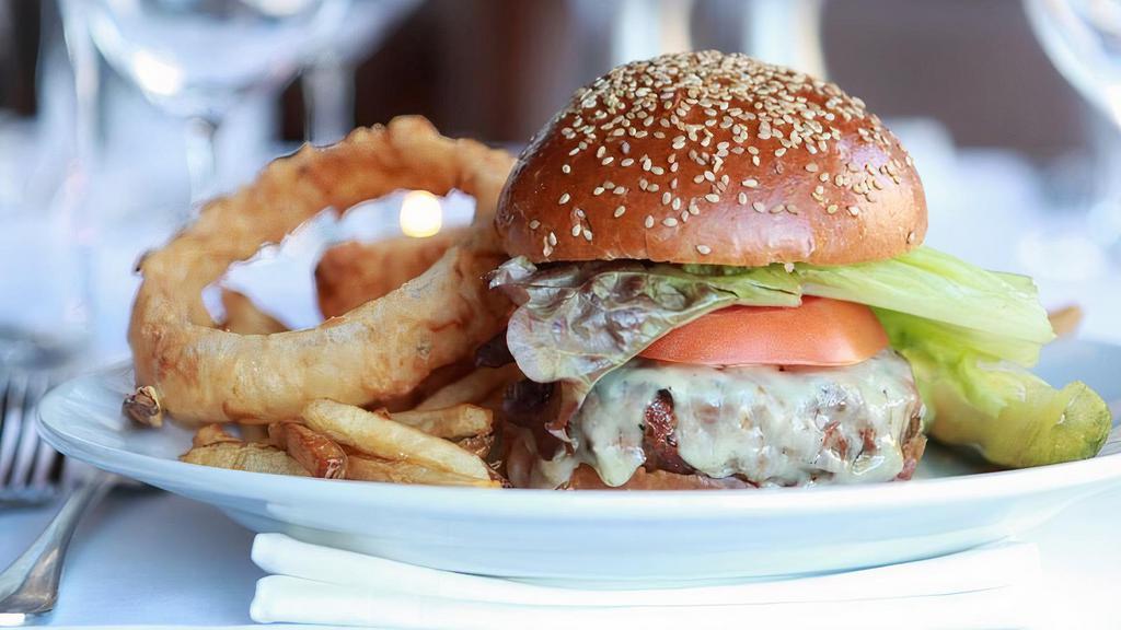 Aged Prime Beef Burger · French fries, lettuce, and tomato.