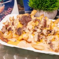 Over The Moon Fries · Large fries covered with cheese, solar sauce and chopped beef burger.