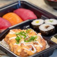 Spicy Ahi Bento · Spicy Ahi on Rice, 2 salmon nigiri, 2 ahi nigiri, 3pcs hosso maki.