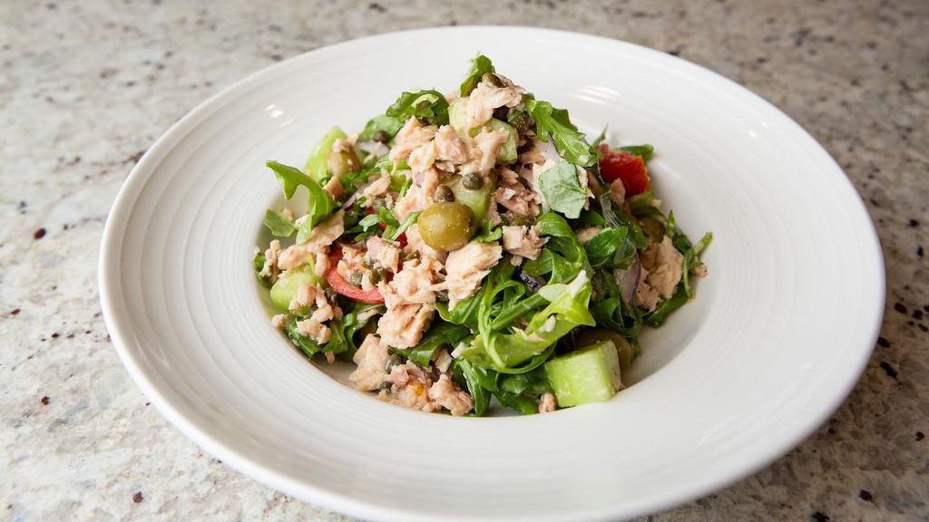 Tonno · Rucola, tuna in oil, red onion, cucumber, capers, olives ,cherry tomatoes, olive oil lemon dressing.
