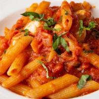 Penne Alla Sorrentina · Plum tomato sauce, fresh mozzarella, basil.