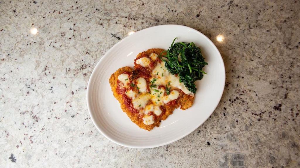 Chicken Parmigiana · Breaded chicken cutlet, tomato sauce, fresh mozzarella, parmigiano, side of your choice