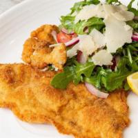 Chicken Milanese · Breaded chicken cutlet, rucola, tomatoes, red onion, shaved Parmigiano, red wine vinaigrette.