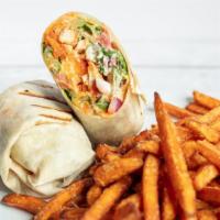 Buffalo Chicken Wrap · Crispy chicken tossed in homemade, spicy buffalo sauce, crisp romaine, tomatoes and red onio...