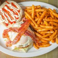 Texas Burger · Burger, cheese, let, tomatoes, bacon, fried egg ,mayo ,ketchup.