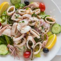 Seafood Salad (Large) · Calamari,
Scungilli,
Shrimp Tossed in Lemon Dressing
