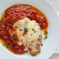 Chicken Parmigiana  · Chicken cutlet with sauce and melted cheese on top.
       CHOOSE PASTA OR SALAD