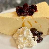 Ny Cheesecake · cherries jubilee & whipped cream