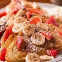 French Toast Platter · Comes with powdered sugar, & butter on top, and side of syrup.