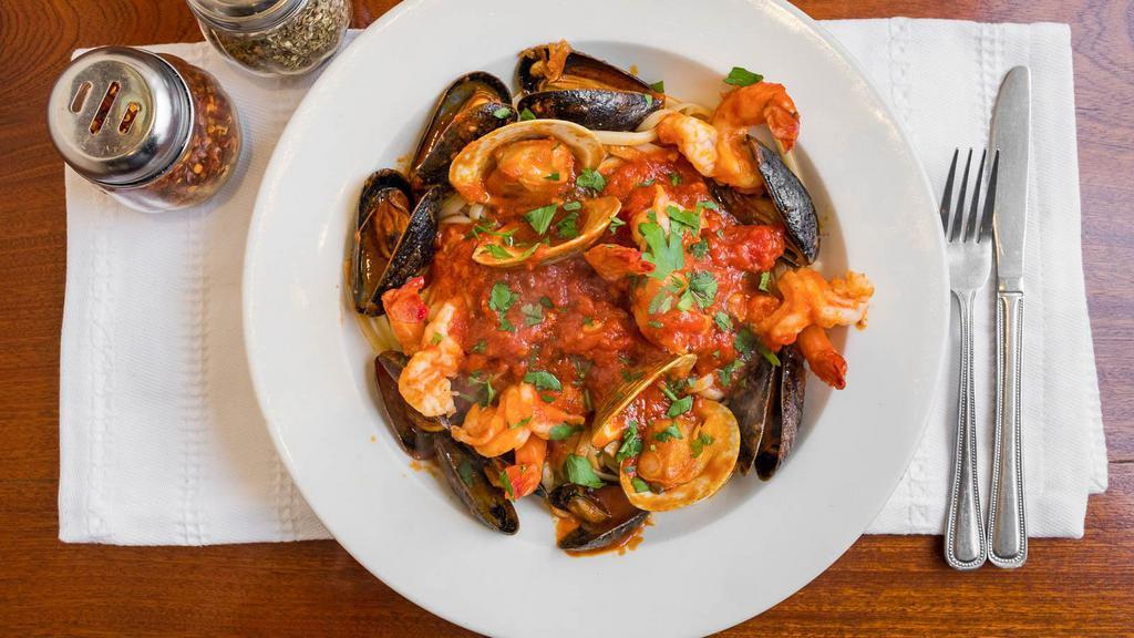 Shrimp Fra Diavolo · Jumbo shrimp with clams and mussels in a spicy marinara sauce.