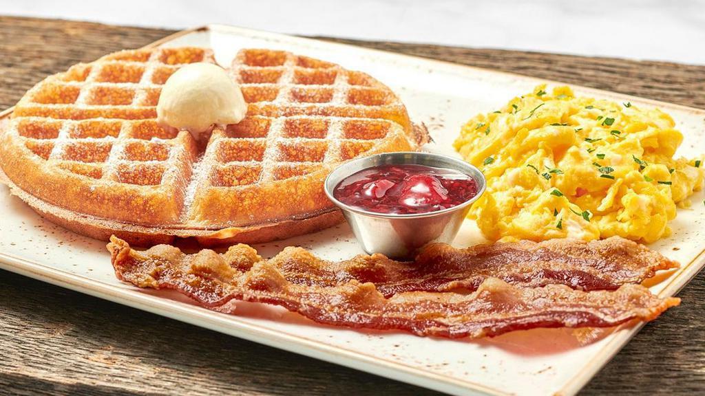 The Trifecta · Two fresh cage-free eggs any style with either a light and airy Belgian waffle or a multigrain pancake. Plus your choice of meat.