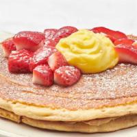 Lemon Ricotta Pancakes · We add fresh, whipped ricotta cheese to our multigrain batter. Served as a “mid-stack” of tw...