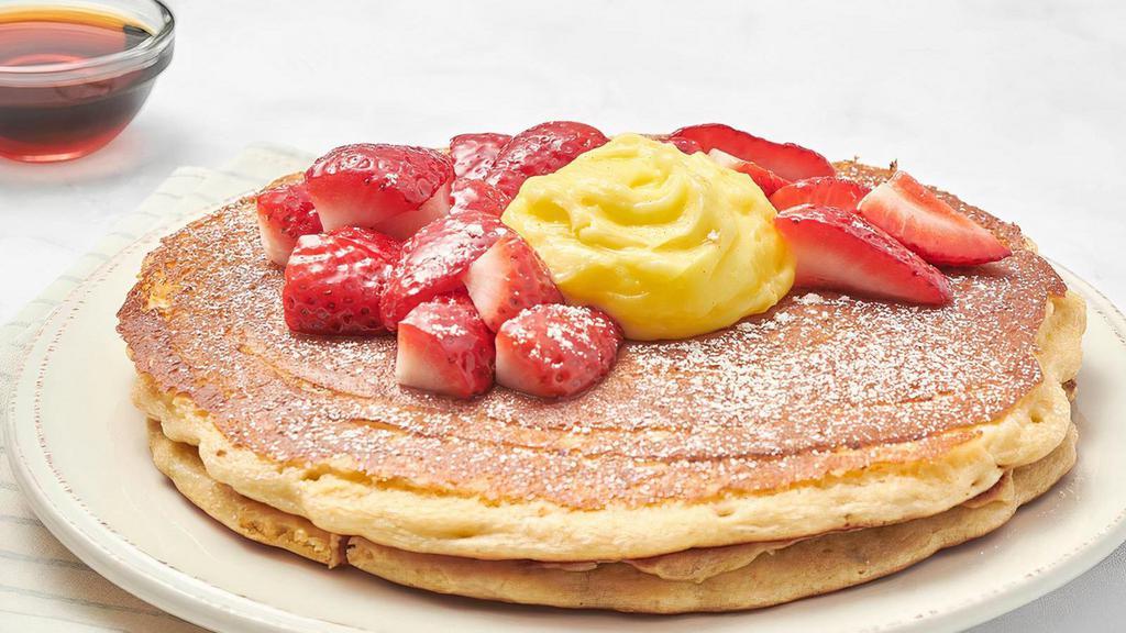Lemon Ricotta Pancakes · We add fresh, whipped ricotta cheese to our multigrain batter. Served as a “mid-stack” of two pancakes topped with berries, creamy lemon curd and powdered cinnamon sugar. .