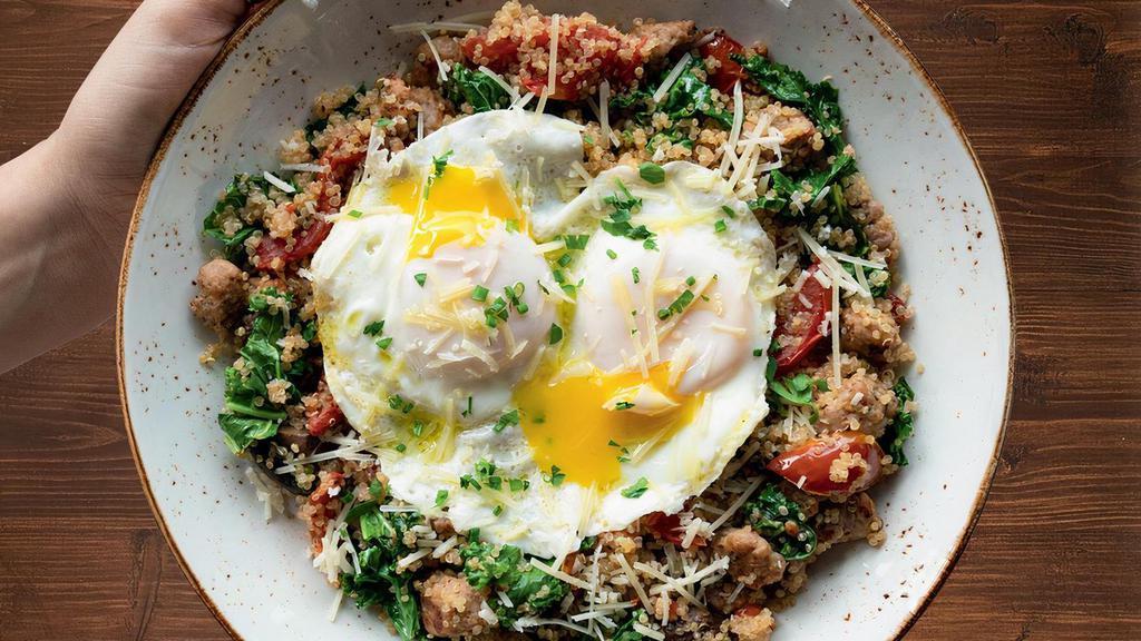 Power Breakfast Quinoa Bowl · Protein-packed quinoa, Italian sausage, house-roasted Crimini mushrooms and tomatoes, kale, Parmesan and EV00. Topped with two basted cage-free eggs.