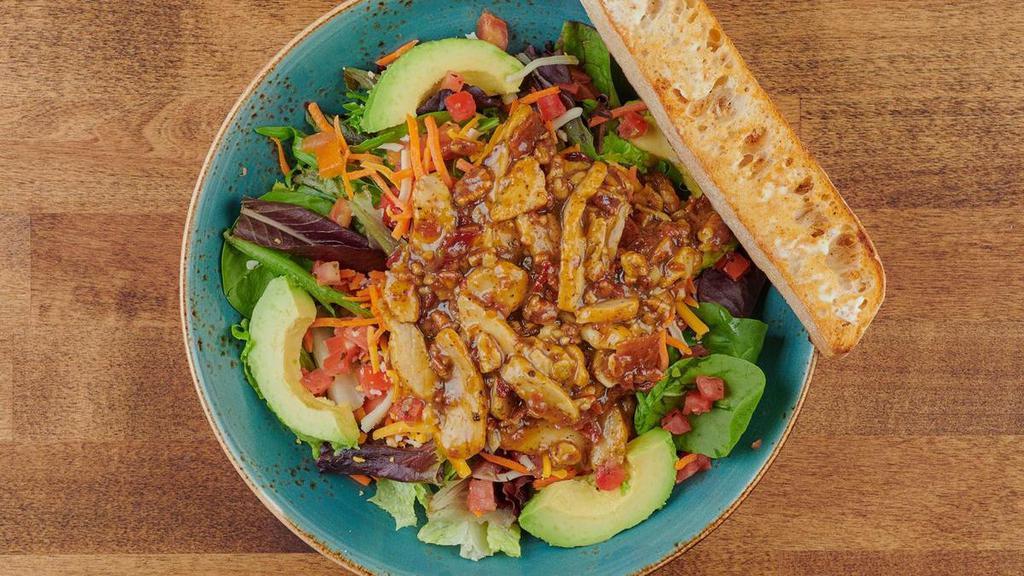 Sweet Honey Pecan Salad · Organic mixed greens, romaine, all-natural chicken breast, bacon, toasted pecans, avocado, tomatoes and carrots with Cheddar and Monterey Jack. Drizzled with warm honey Dijon dressing. Served with artisan ciabatta toast.