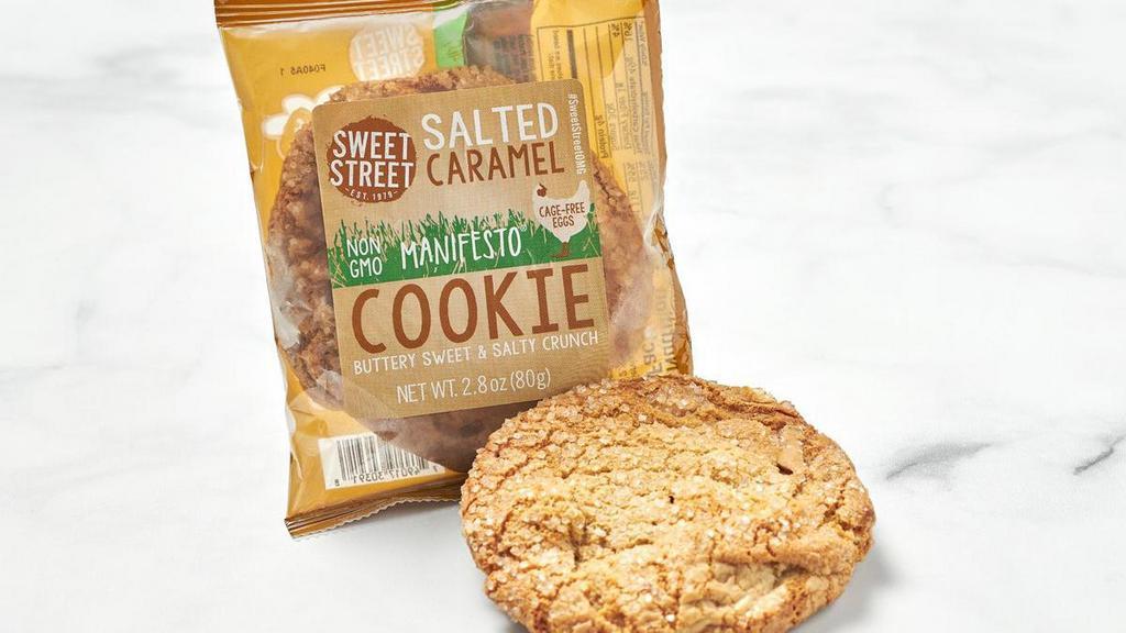Grab N Go Salted Caramel Cookie · All natural toffee and milky white chocolate chunks, alongside crisp pretzels bites and sea salt. Topped with pretzel salt and golden demerara sugar. Free of GMO’s, additives and artificial colors. Individually wrapped.