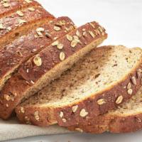 Loaf Of Seed’Licious Bread  · One loaf of our signature thick-cut whole grain artisan bread. It’s great for homemade Avoca...