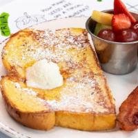 Kids French Toast · Made with our house-made batter. Served with. fresh fruit and your choice of bacon or sausage.