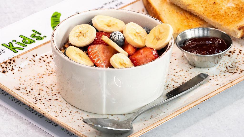 Kids Granola Bowl · Non-fat vanilla Greek yogurt topped with our. housemade granola with almonds, bananas,. strawberries, blueberries and sprinkled with. powdered cinnamon sugar. Served with. sourdough toast.