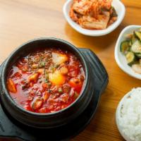 Budae Jjigae · Pork, kimchi, ham, cheese, tofu stew and noodles.