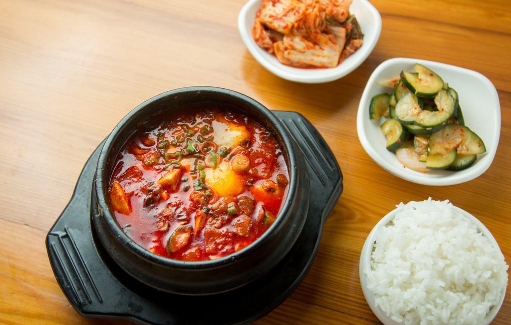 Budae Jjigae · Pork, kimchi, ham, cheese, tofu stew and noodles.