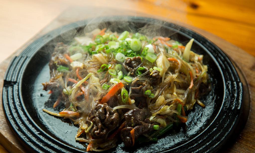 Japchae Noodles · Stir-fried glass noodles, beef and seasonal vegetables.