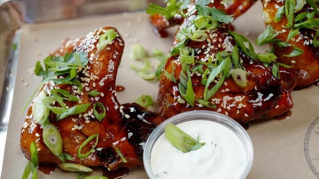 Wings · 3 WHOLE WINGS . Spicy Vietnamese Style with Sesame Seeds, Scallions and Cilantro Ranch. contains gluten + dairy. cannot be made without