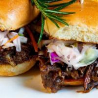 Braised Oxtail Sliders 2Pcs · Served with fries, salad or sautéed veg Oven braised oxtail served with coleslaw on a sweet ...