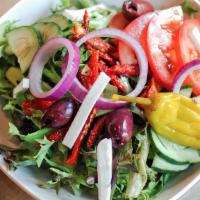 House Salad · Mixed Green, red onion, red bell peppers, tomato and cucumber with house balsamic dressing