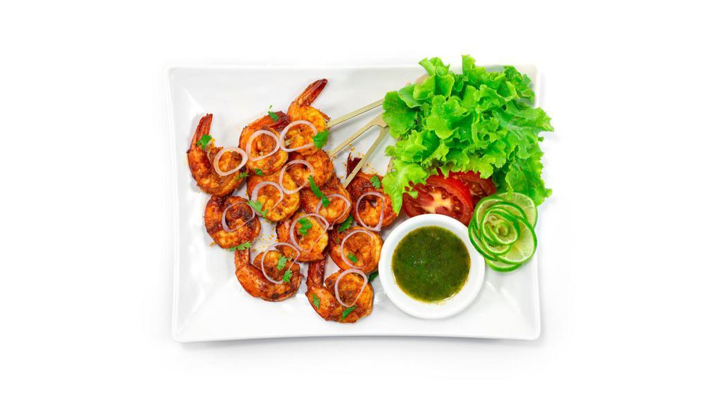 Tandoori Shrimp · Yummy shrimp marinated in authentic spiced yogurt and herbs in charcoal oven.