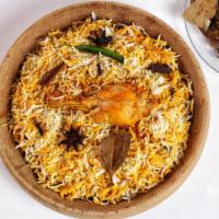 Hyderabadi Chicken Matka Biryani · Fresh authentic chicken biryani in a special sealed clay pot.