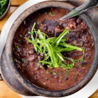 Feijoada · Black Bean Stew - Pork, collard greens, orange, rice & farofa