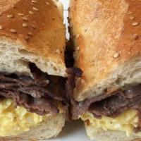 Steak Hoagie · Philly cheese steak with American cheese, scrambled eggs, onions and peppers on a hoagie.