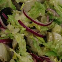 House Salad · Lettuce, tomato, onion, parsley.