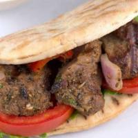 Lamb Shish Kabab  Sandwich · Charcoal grilled cubes of lean beef marinated.