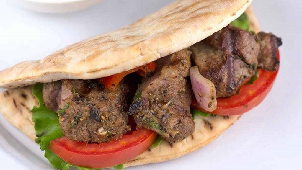 Lamb Shish Kabab  Sandwich · Charcoal grilled cubes of lean beef marinated.