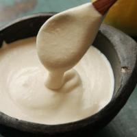 Tahini Sauce · Pureed sesame seed, garlic & lemon.