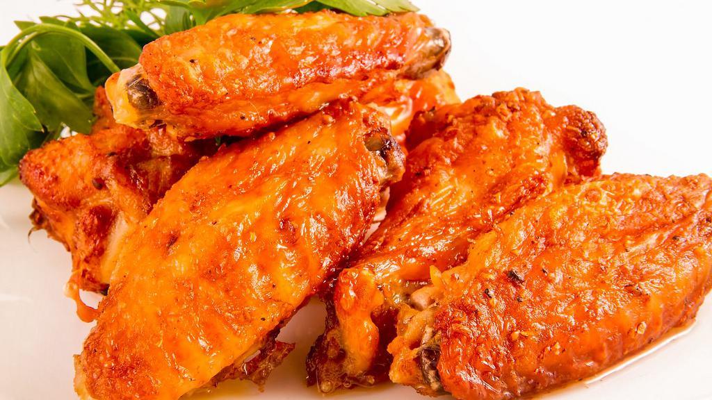 Honey Bbq Wings (6
Pieces) · Golden, fried, crispy on the outside, juicy on the inside wings glazed with sweet and smoky BBQ sauce. Served with celery and carrot sticks and your choice of dip.