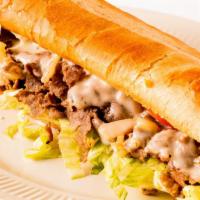 Classic Cheesesteak · Juicy, chopped steak and grilled onions with melted American cheese on a soft roll.