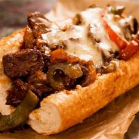 Bacon Ranch Cheesesteak · Juicy, chopped steak and crispy bacon with melty cheddar cheese and ranch dressing on a soft...