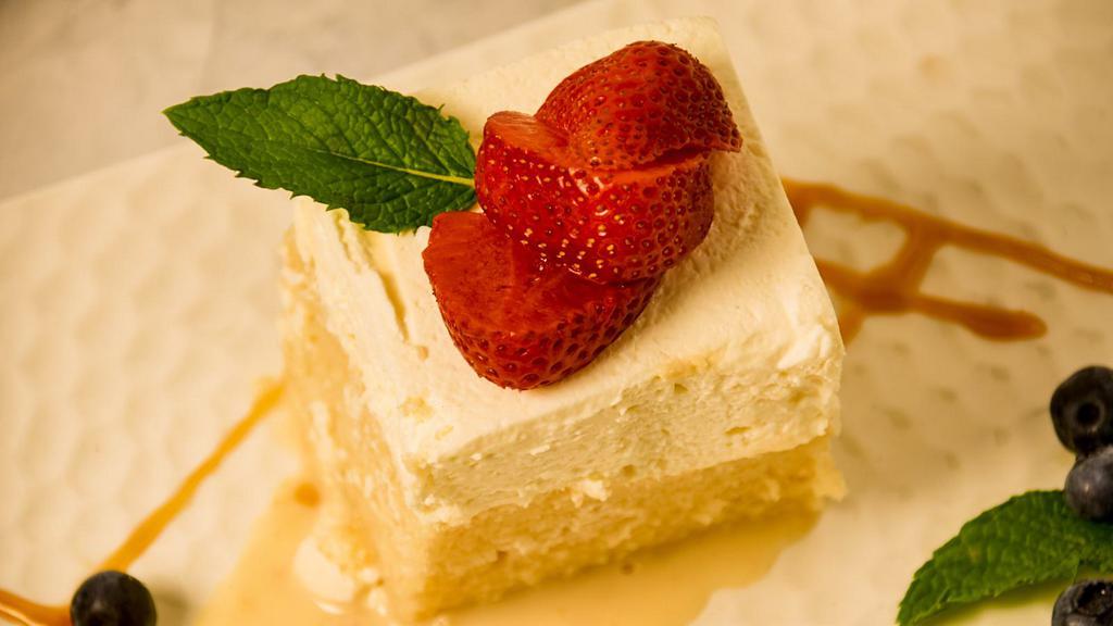 Tres Leche Cake · Buttery sponge cake drenched in a sweet milk mixture.