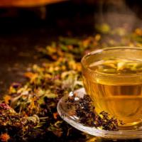 Herbal Tea · Freshly steeped, green herbal tea.