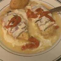 Chicken Sinatra · Battered francaise style, layered with eggplant, prosciutto, fresh mozzarella, and roasted p...