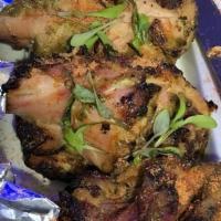 Tangdi Kabab · Three pieces. Chicken drumsticks marinated in aromatic spices, garlic, ginger and grilled in...
