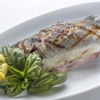 Branzino · Roasted with rosemary and shallots in a garlic sauce.