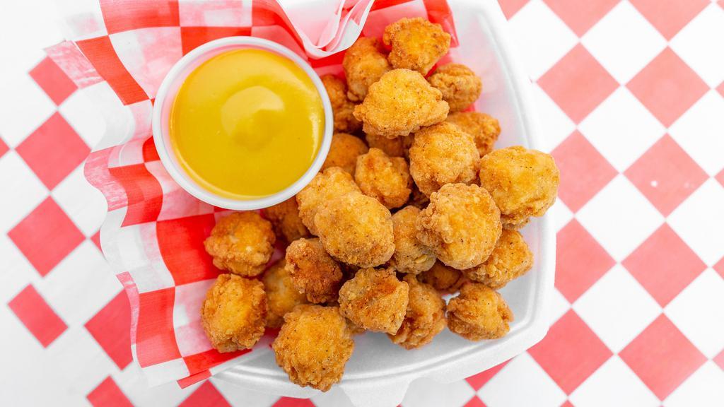 Combo #7 (Popcorn Chicken) · Popcorn chicken with choice of BBQ, buffalo, or honey mustard sauce. Combo comes with French fries and soda.