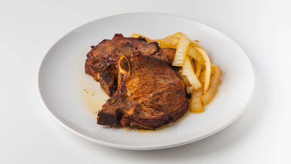Fried Pork Chops · 1/2 inch, center cut pork chops marinated for 12 hours, deep fried to perfection