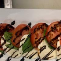Caprese · Fresh mozzarella cheese, tomatoes, basil, reduced balsamic, imported olive oil